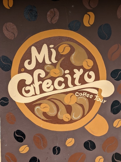       Sign for Mi Cafecito coffee tour.
  