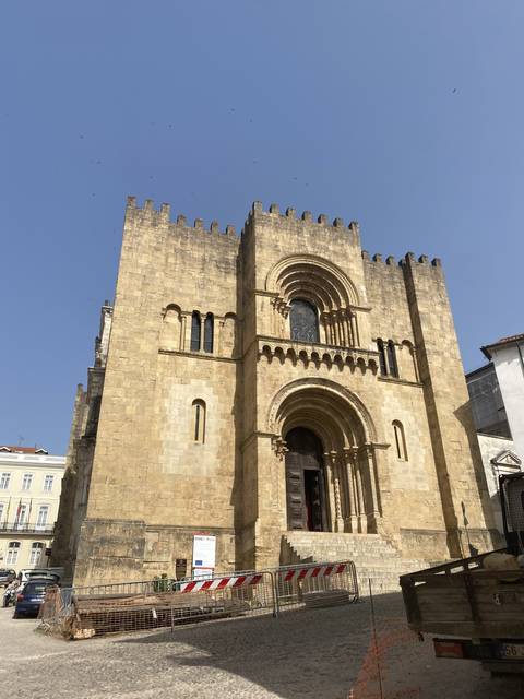 Historic stone building with ornate architectural details.