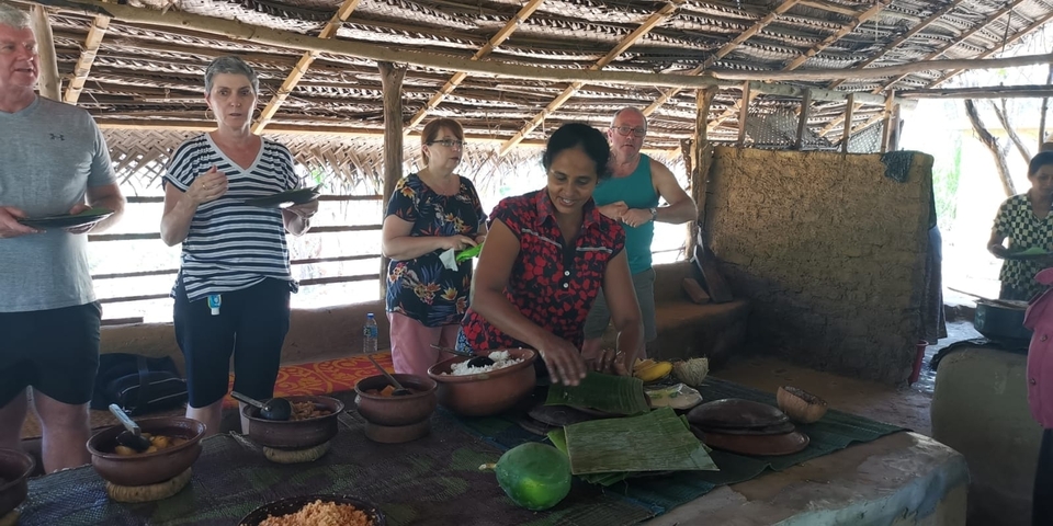 People preparing traditional food.