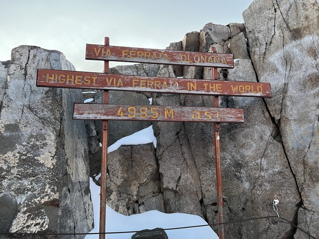       Signpost for the highest via ferrata in the world.
  