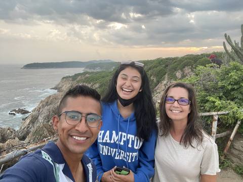       Group photo with ocean view and coastline
  