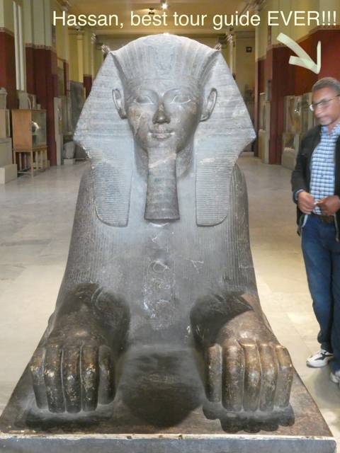 Ancient Egyptian statue inside a museum.