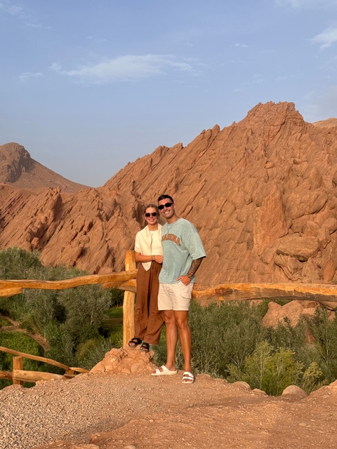 Couple posing in rocky landscape