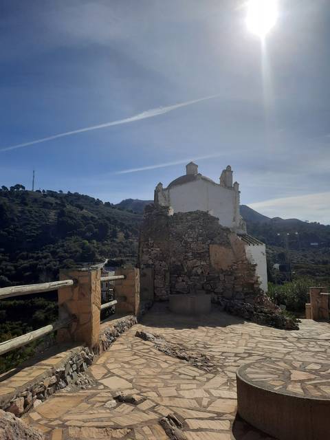 Ancient stone ruins with blue sky.