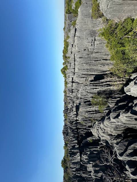 Rocky landscape with sharp peaks pointing upwards.