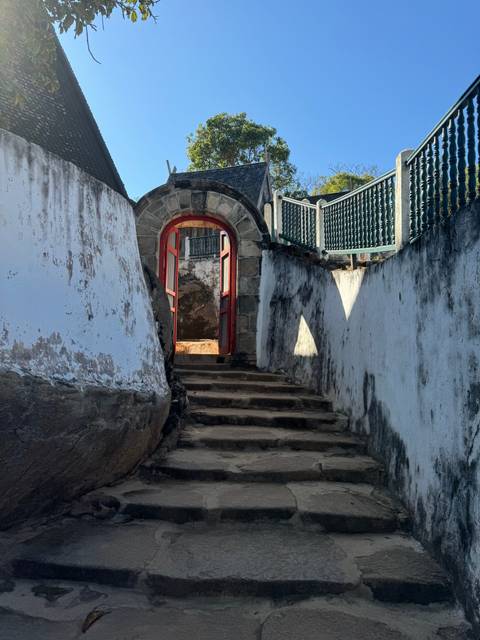 Stone steps leading to a traditional entrance.