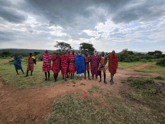 Group photo of Maasai people in traditional attire.