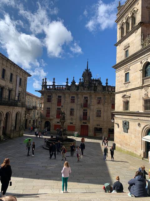       A public square with an ornate historic building.
  