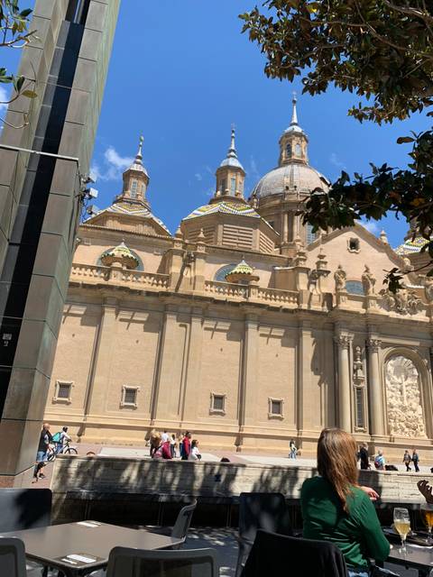       A historic building with a dome and ornate details.
  