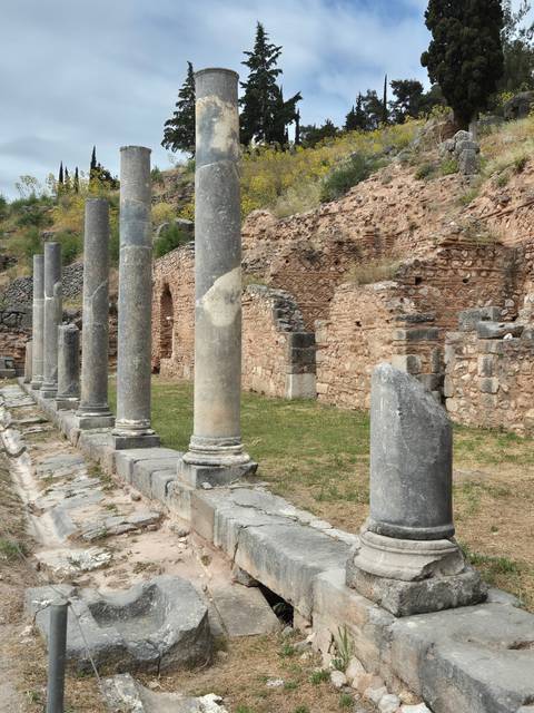 Ancient ruins with stone columns.