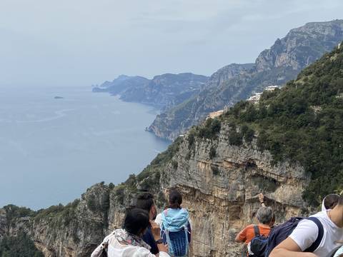       Dramatic coastal cliffs with distant views of the sea and islands.
  
