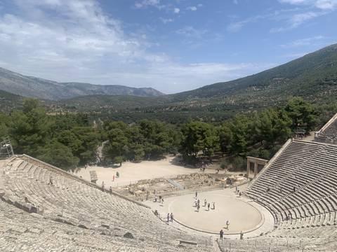       Ancient amphitheater with a view of surrounding landscape.
  
