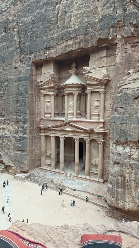 The Treasury of Petra carved into the cliffside.