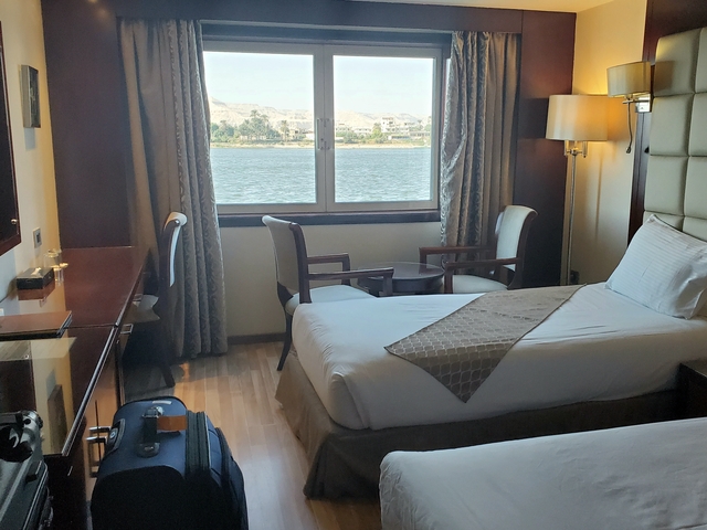 View from a hotel room overlooking a river.