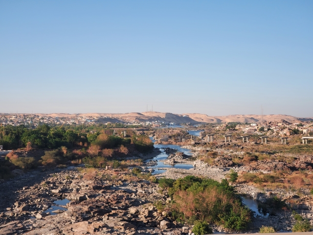 A scenic view of a river and rocky landscape in Egypt.