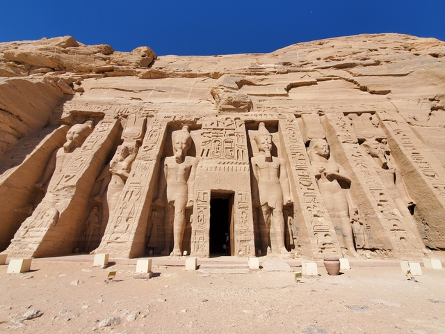 Detail of the facade of the Abu Simbel temples with large statues.