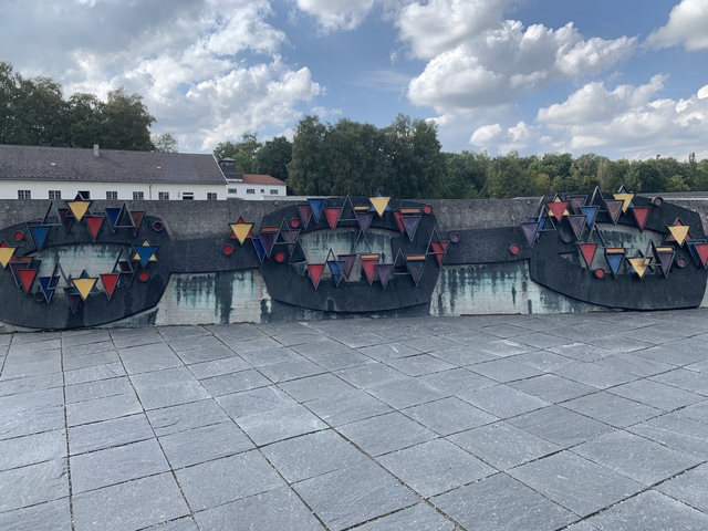Memorial wall with colorful design.