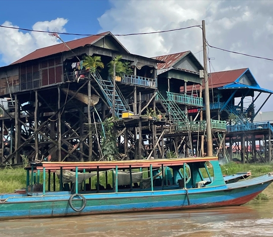       Stilt houses in a floating village.
  