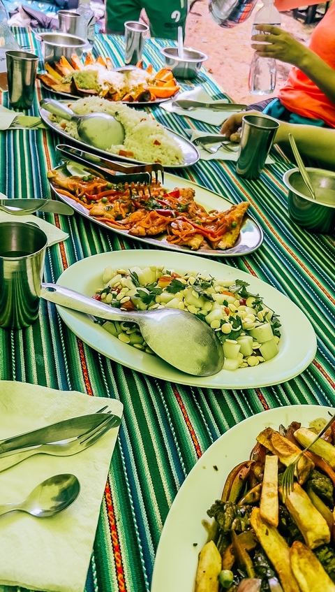 Traditional Peruvian dish on a colorful tablecloth.