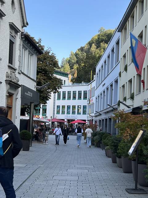 Street scene with buildings and pedestrians.