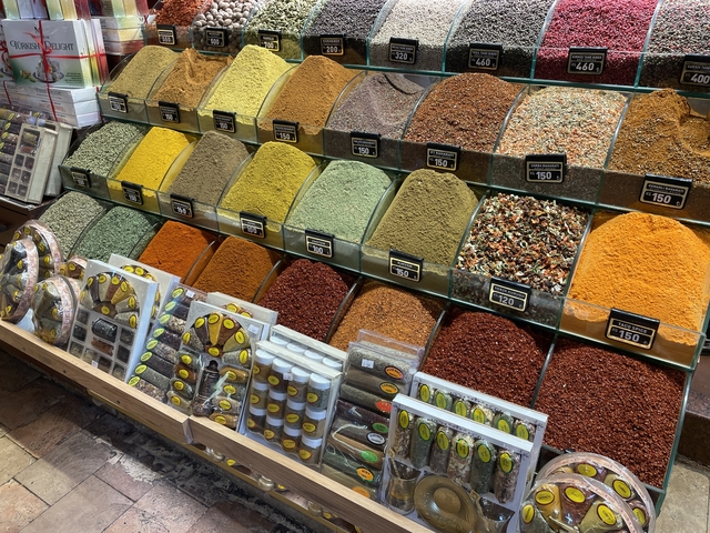 Various spices displayed in a market.