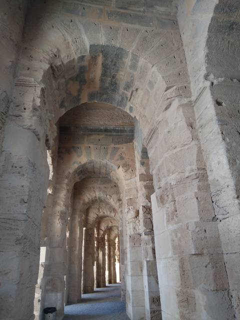 Stone archways inside a historic site.