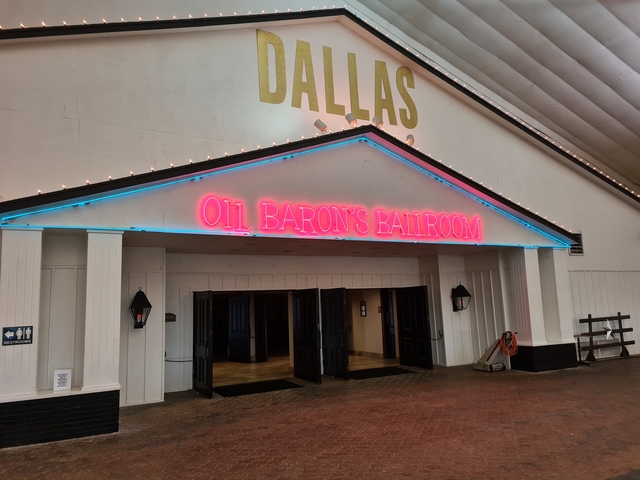 Entrance of Oil Baron's Ballroom with neon lights.
