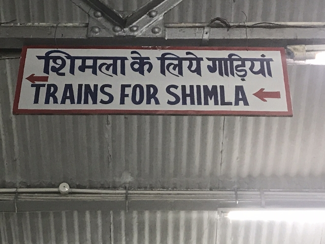       Sign indicating 'Trains for Shimla'
  