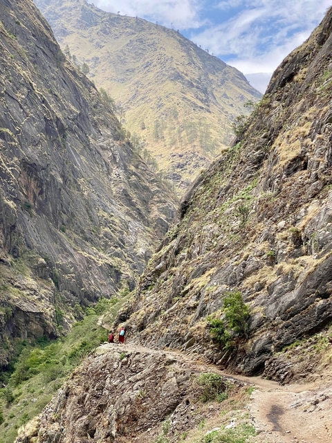       Gorge with steep rocky walls.
  