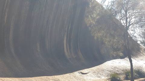       Wave Rock formation in an upside-down view.
  