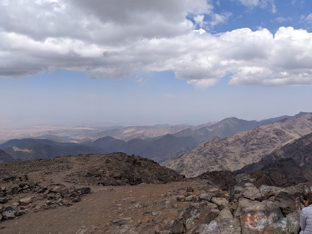 Mountain range with cloudy sky.