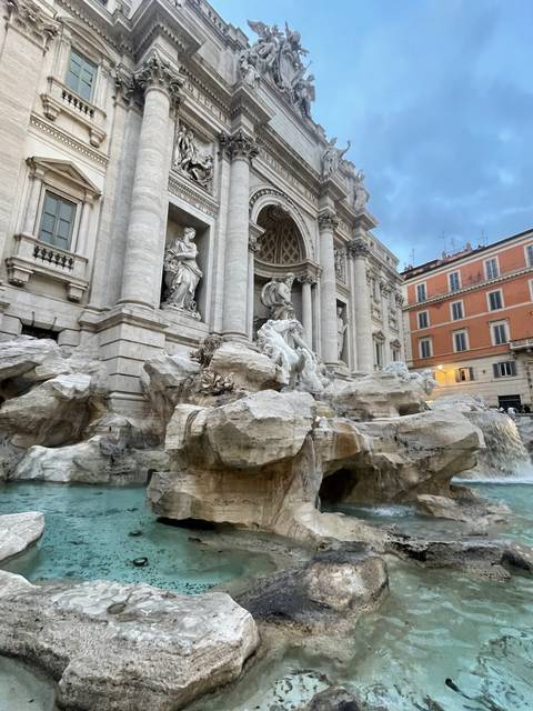 The Trevi Fountain with sculptures.