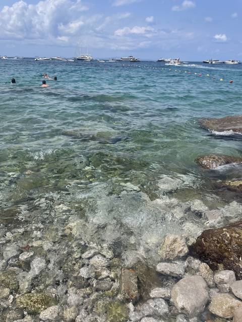 Clear waters and shoreline.