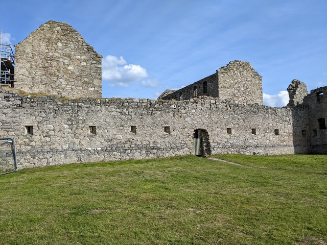 Old stone walls of a castle ruin.