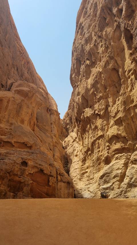       Rock formation with clear blue sky in the background.
  