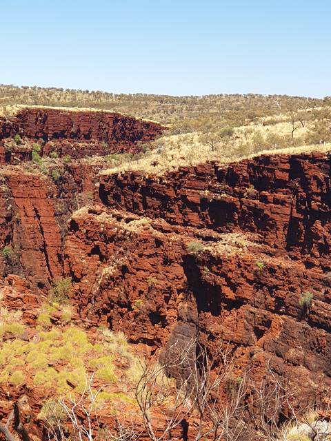       An intricate series of red rock formations.
  