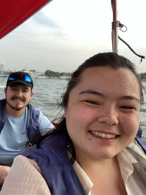       Selfie of a person on a boat with water in the background.
  