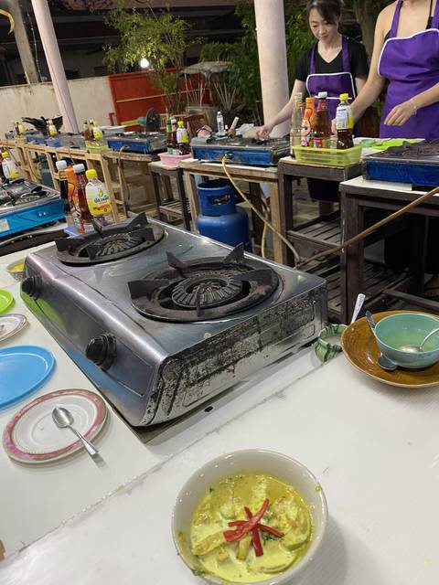       A setup for cooking with a stove and ingredients displayed.
  