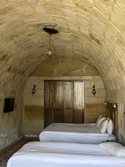      Upside-down view of a rocky interior.
  