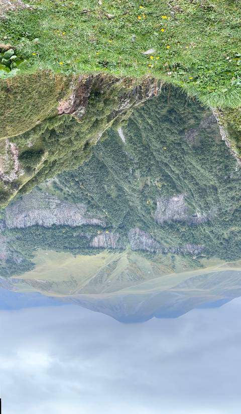 Scenic mountain landscape with lush greenery.