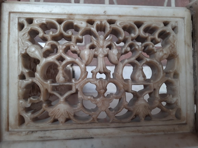       Close-up of intricate stone carvings.
  