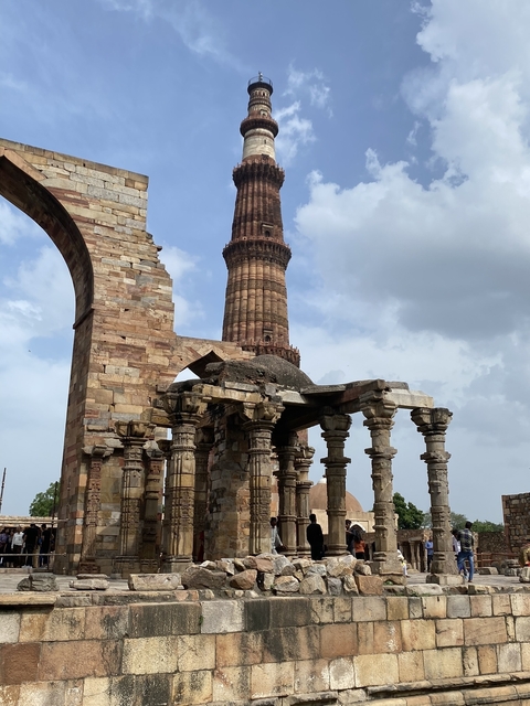       Ancient sandstone tower and ruins.
  