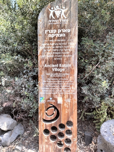       Sign depicting Ancient Katzrin Village information.
  