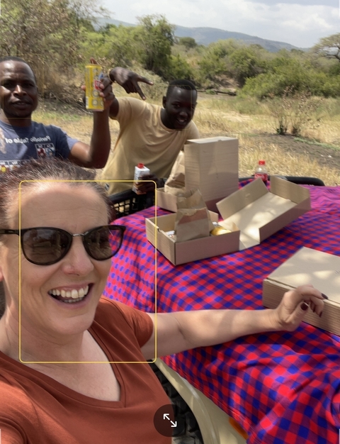       Close-up portrait of a smiling person outdoors
  