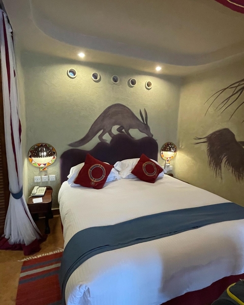 Unique decorated room with African-inspired wall art
