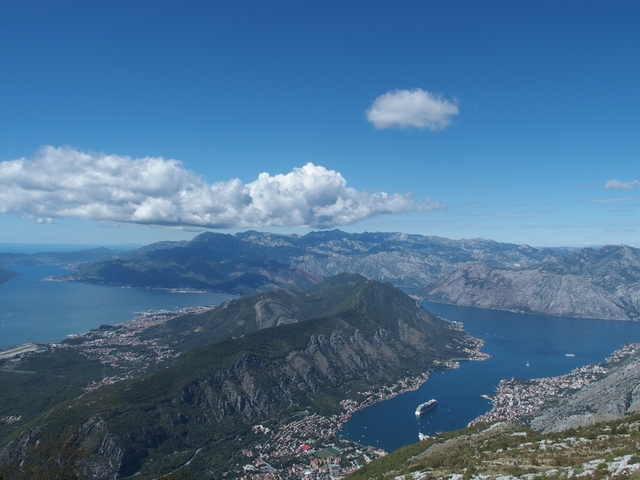Aerial view of a mountainous landscape with coastlines.
