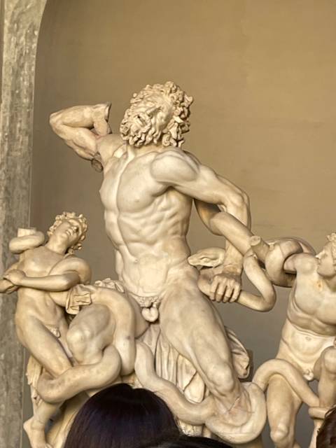       Classical sculpture of a figure with a beard
  