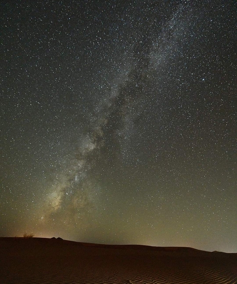       Starry night sky with the Milky Way visible.
  