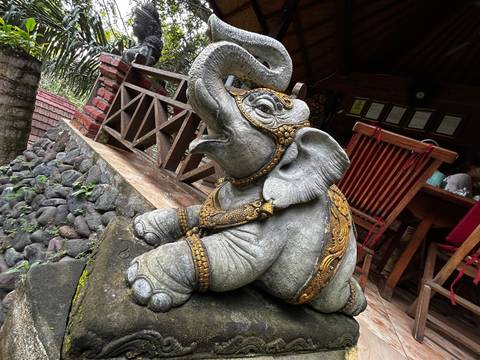 Statue of an elephant upside-down.