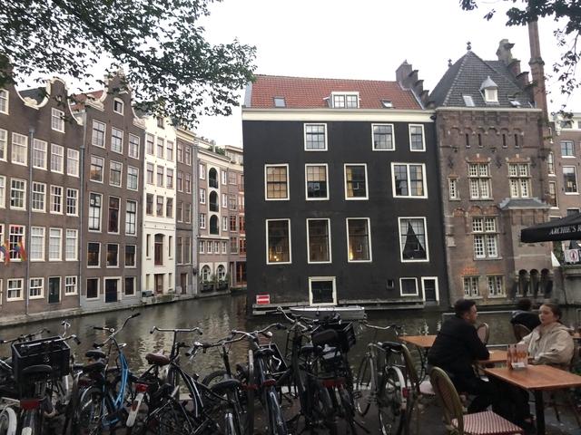       Canal view with traditional houses.
  